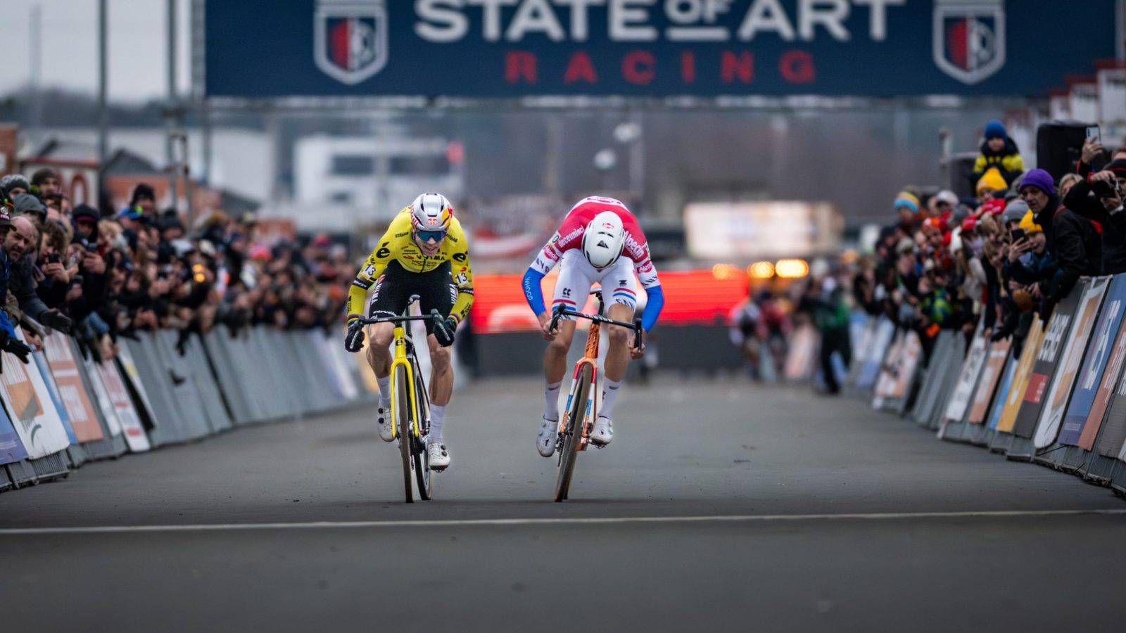 Belgian Wout van Aert and Dutch Tibor Del Grosso crosses the finish line at the men elite race at the cyclocross cycling event in Heusden-Zolder, stage 5/8 in the Superprestige competition, Tuesday 23 December 2025. BELGA PHOTO DAVID PINTENS